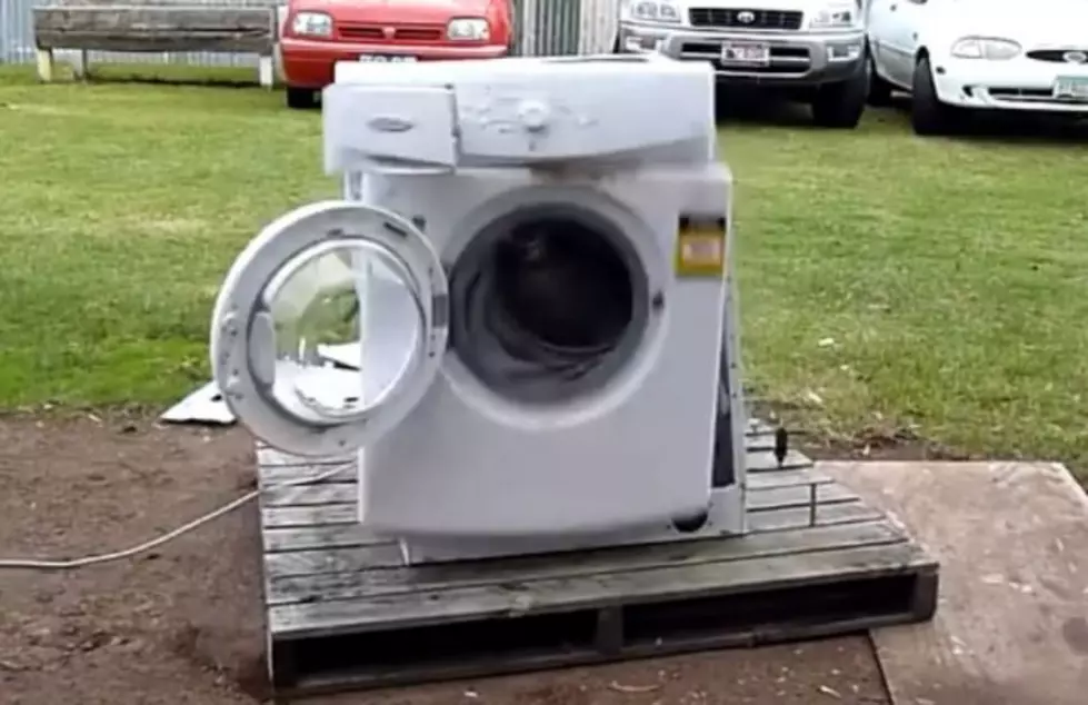 Extremely Bored Guy Destroys a Washing Machine for Our Entertainment