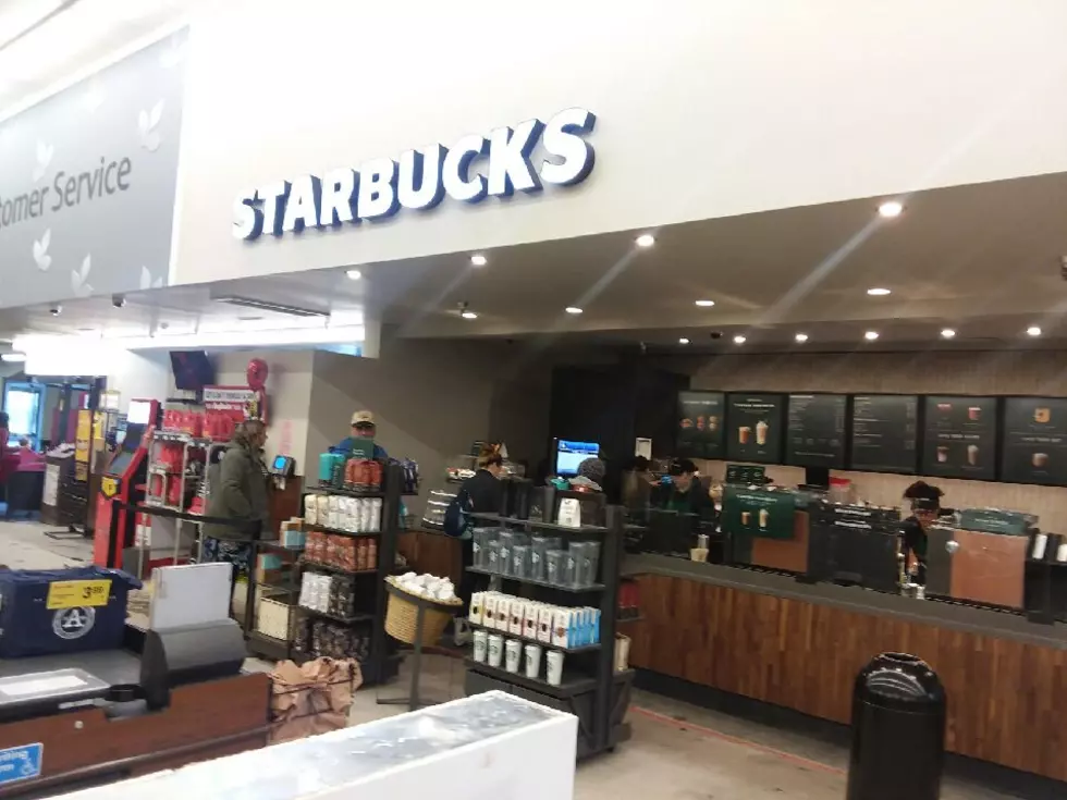 Starbucks Opens For Business to Waiting Fans