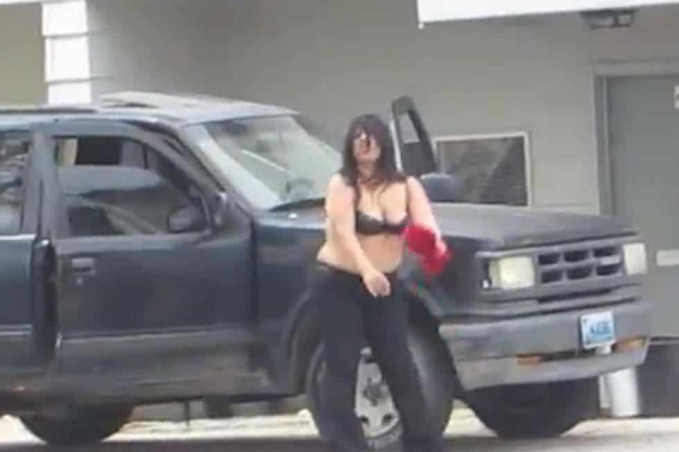 Topless Woman Dances on the Street to Katy Perry Track