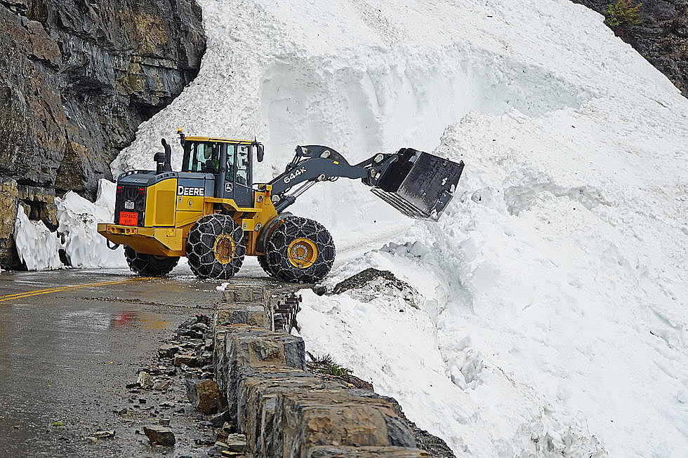 See the Mountains of Snow Being Cleared in Glacier National Park