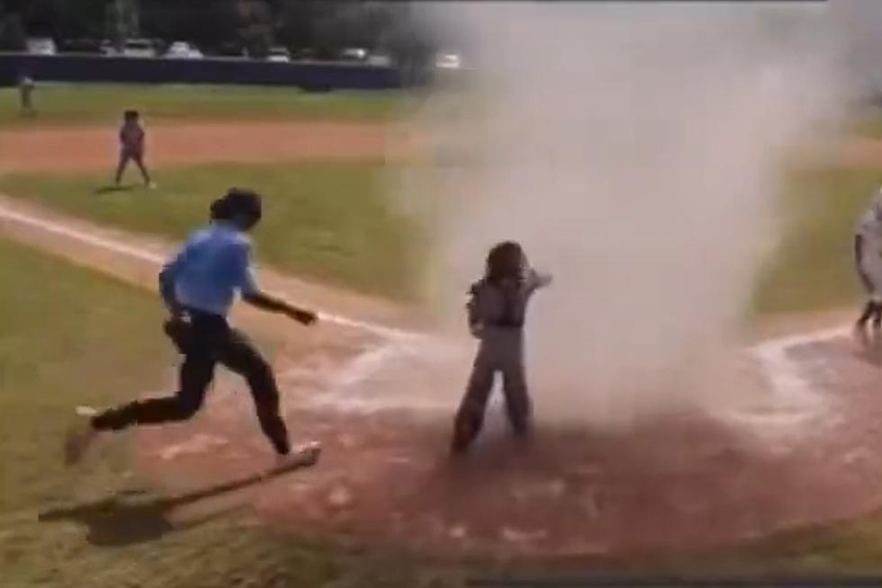 Watch Quick-thinking Umpire Save Player from Florida &#8216;Dust Devil&#8217;