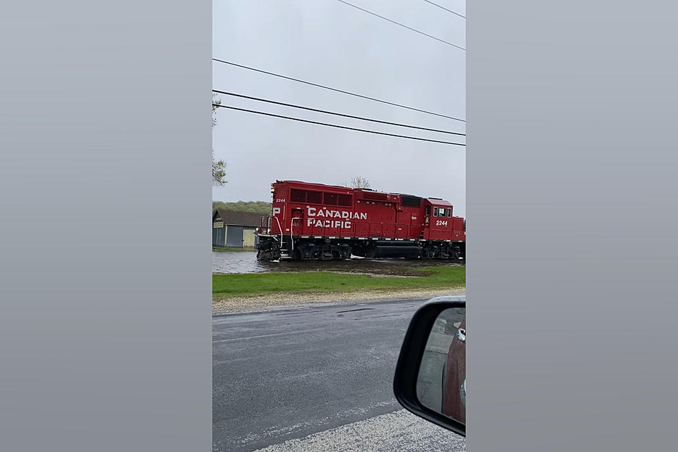 Illinois Train Carefully Navigates Mississippi River Flood Waters