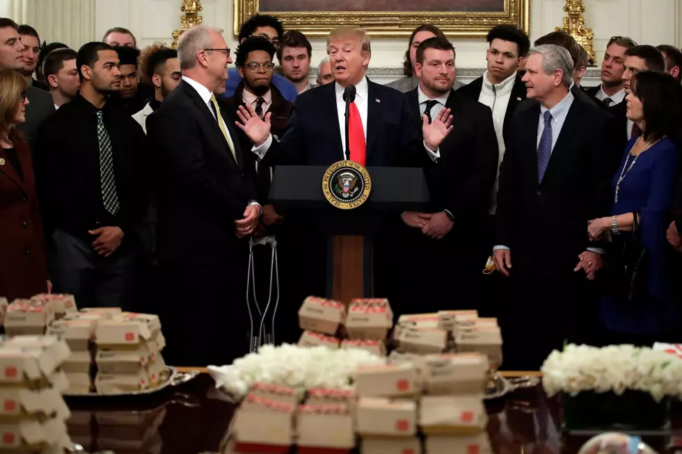President Donald Trump welcomes the 2018 NCAA FCS College Football Champions, The North Dakota State Bison, to the State Dining room of the White House in Washington, Monday, March 4, 2019, with McDonald's and Chick-fil-A fast food.