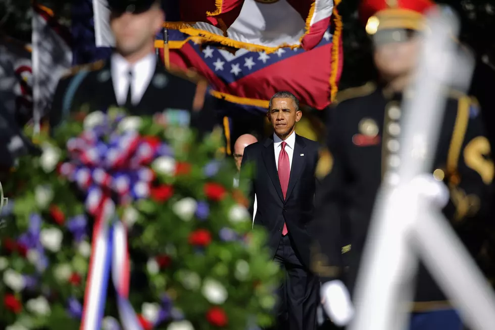 Obama Visits Arlington National Cemetery to Honor Veterans