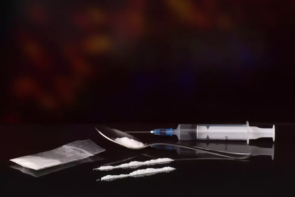 Police Find Drugs and a Loaded Syringe Inside a Woman's Backpack