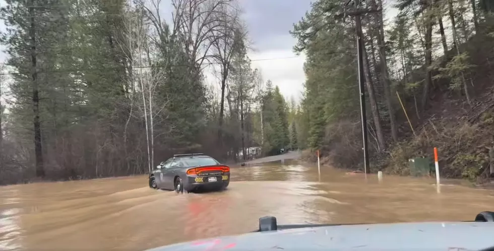 Troopers navigate around a washout; MHP photo via Facebook