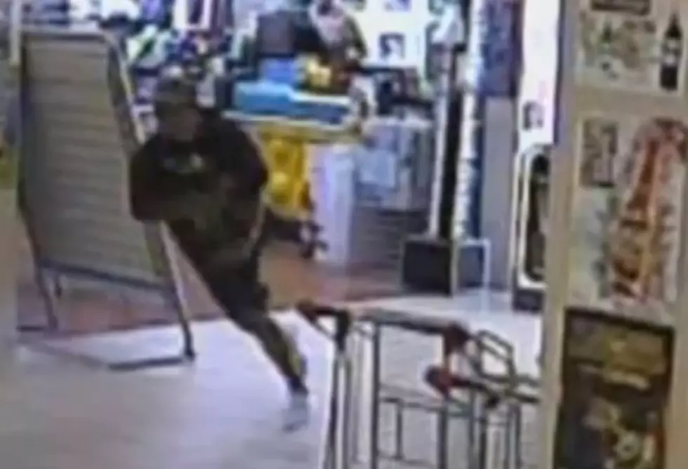 Purse Thief Crashes Into Window While Trying To Run Away [Video]