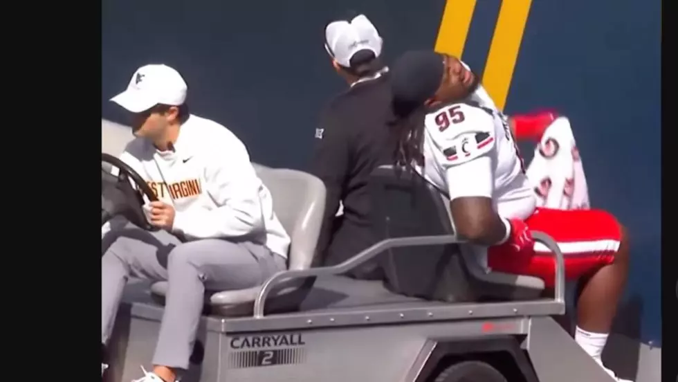Injured Football Player Backed Into A Wall