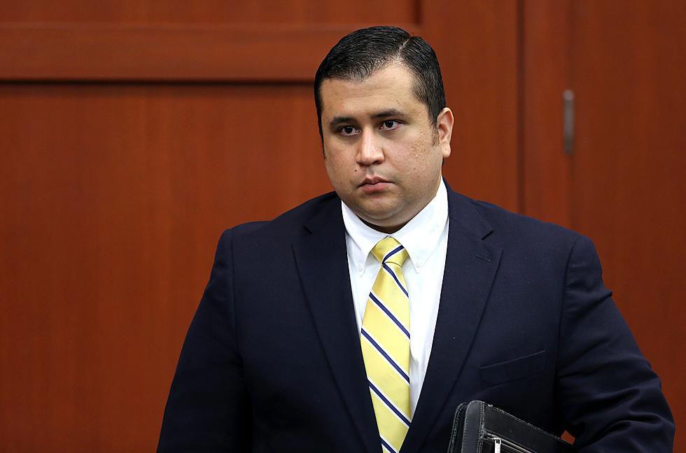Police report: Zimmerman Took Photos at House