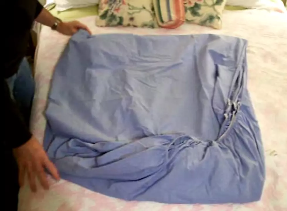 How To Fold a Fitted Sheet Without Cursing [VIDEO]