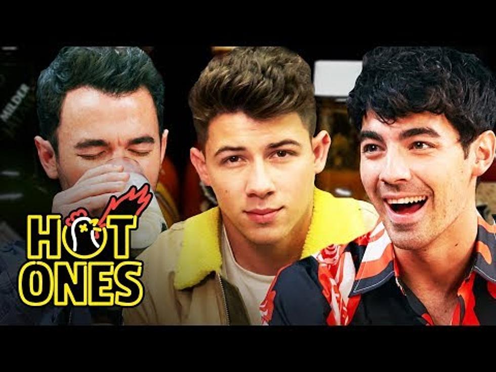 The Jonas Brothers Take The Hot Ones Hot Wing Challenge & Suffer For It