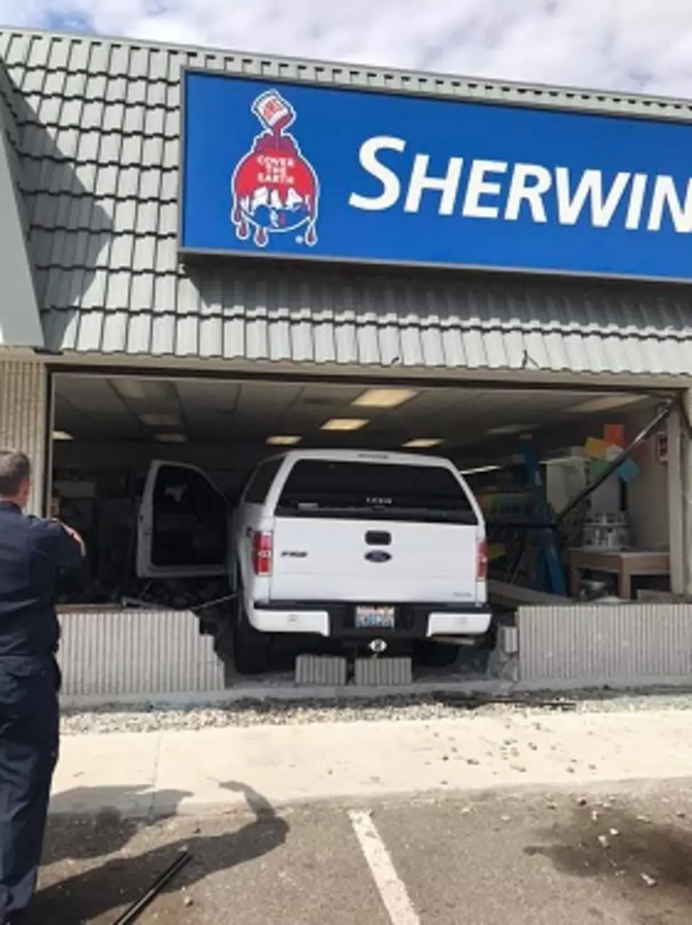 Car Crashes Through Front Lobby Of Sherwin-Williams Store