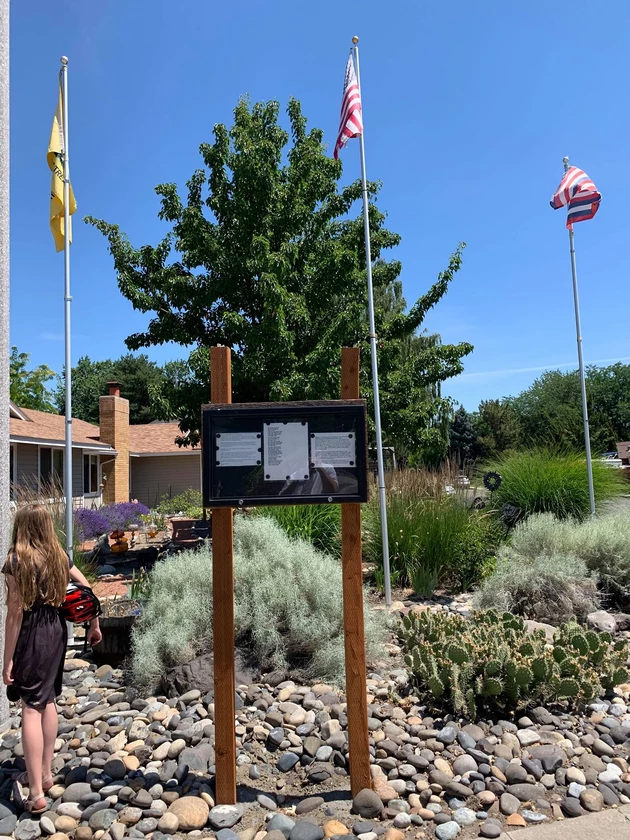 See the Richland House With a Flag Exhibit in the Front Yard