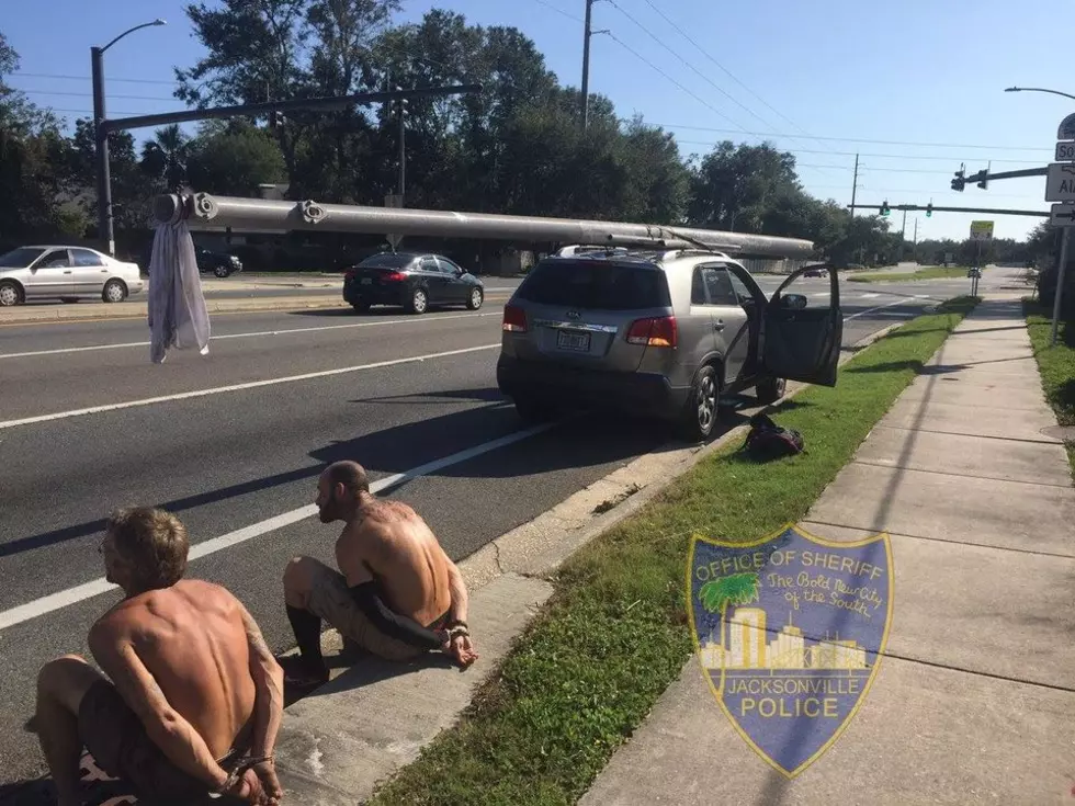 Two Men Steal Power Pole - Drive Through Town with It!