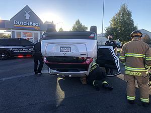 Driver and Car &#8220;Flip&#8221; In Front Of Pasco Dutch Bros.