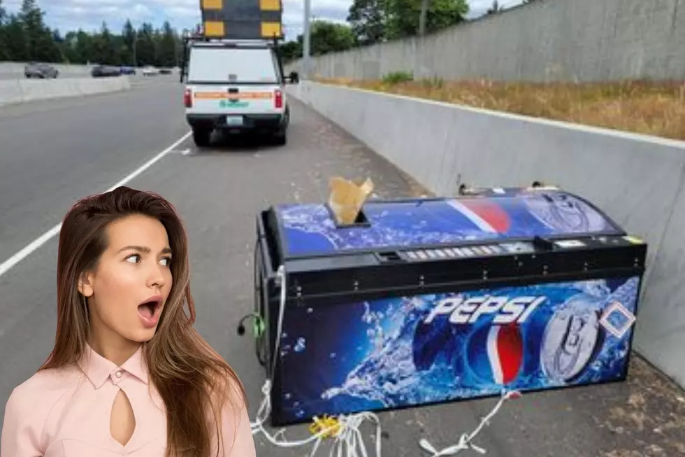 Poorly Packed Pop Machine Falls From Truck Landing on WA Roadside [VIDEO]