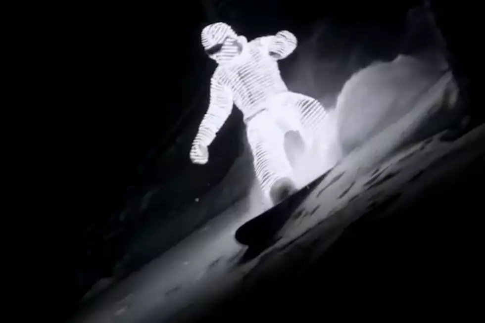 Check Out This Awesome Video of a Guy in Light Suit Snowboarding in the Dark