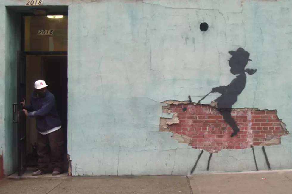 business owner removes banksy from building