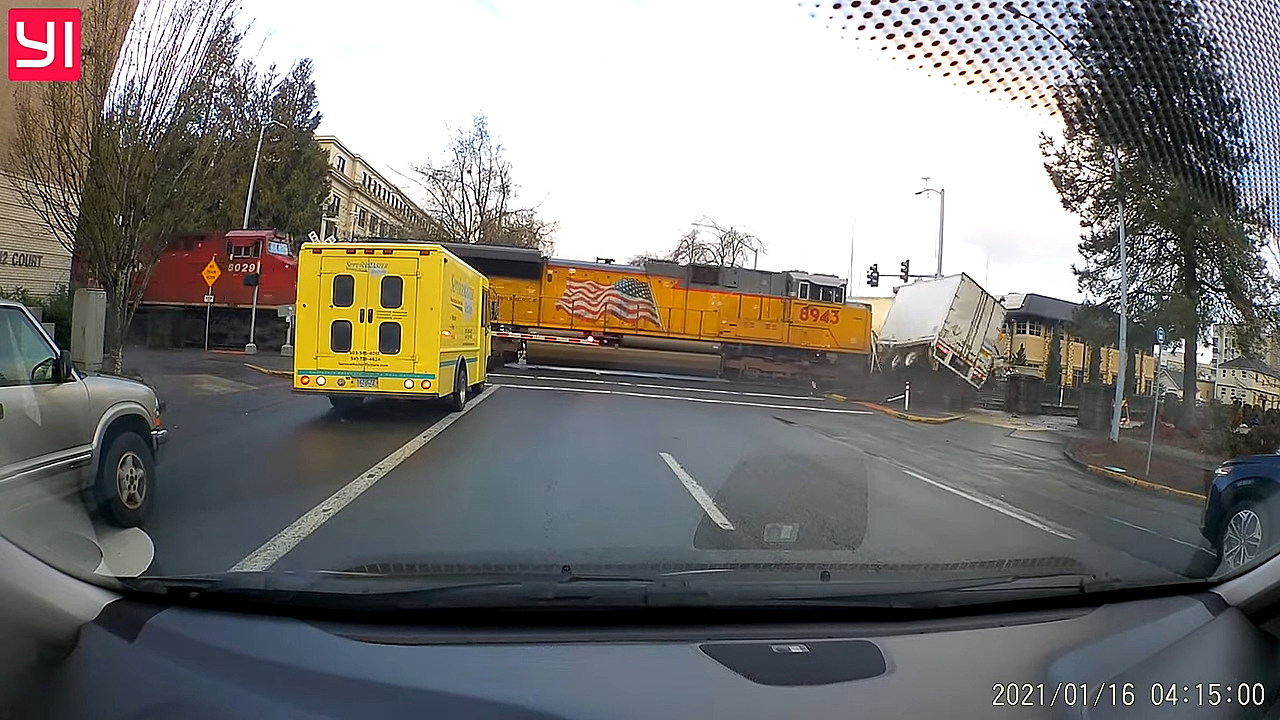 Salem, Oregon Semi-Truck Gets Destroyed by Massive Train pic