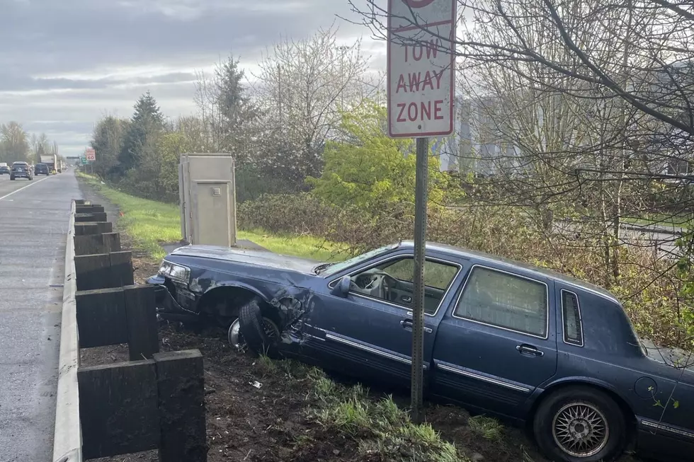 Car Crashed, Left Abandoned Next to Washington Tow Away Zone Sign