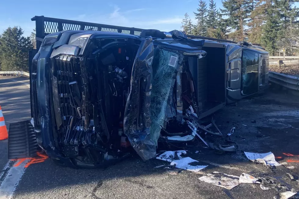 Speeding Car Hauler Truck Tips Over in Front of Traffic on I-5