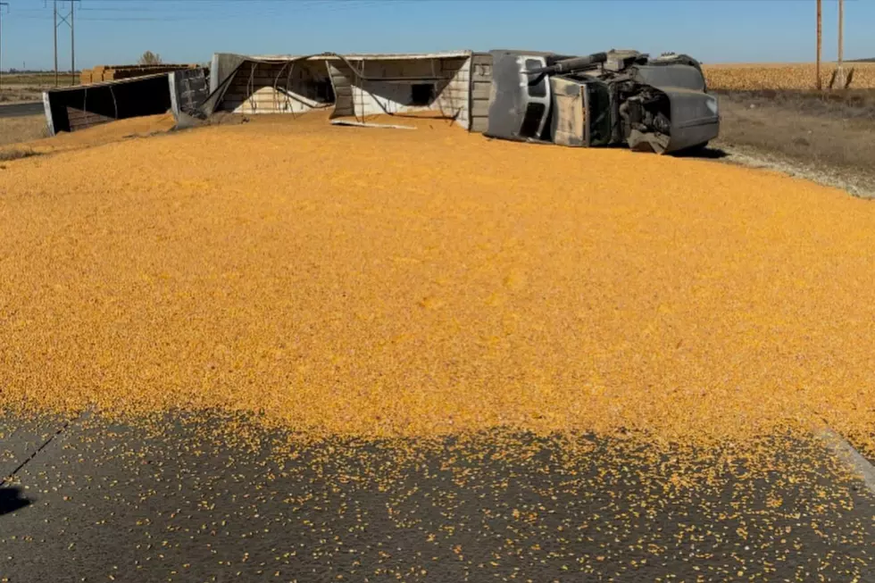 Semi Rolls Over on Highway 395 North of Pasco, Spilling Load Across All Lanes
