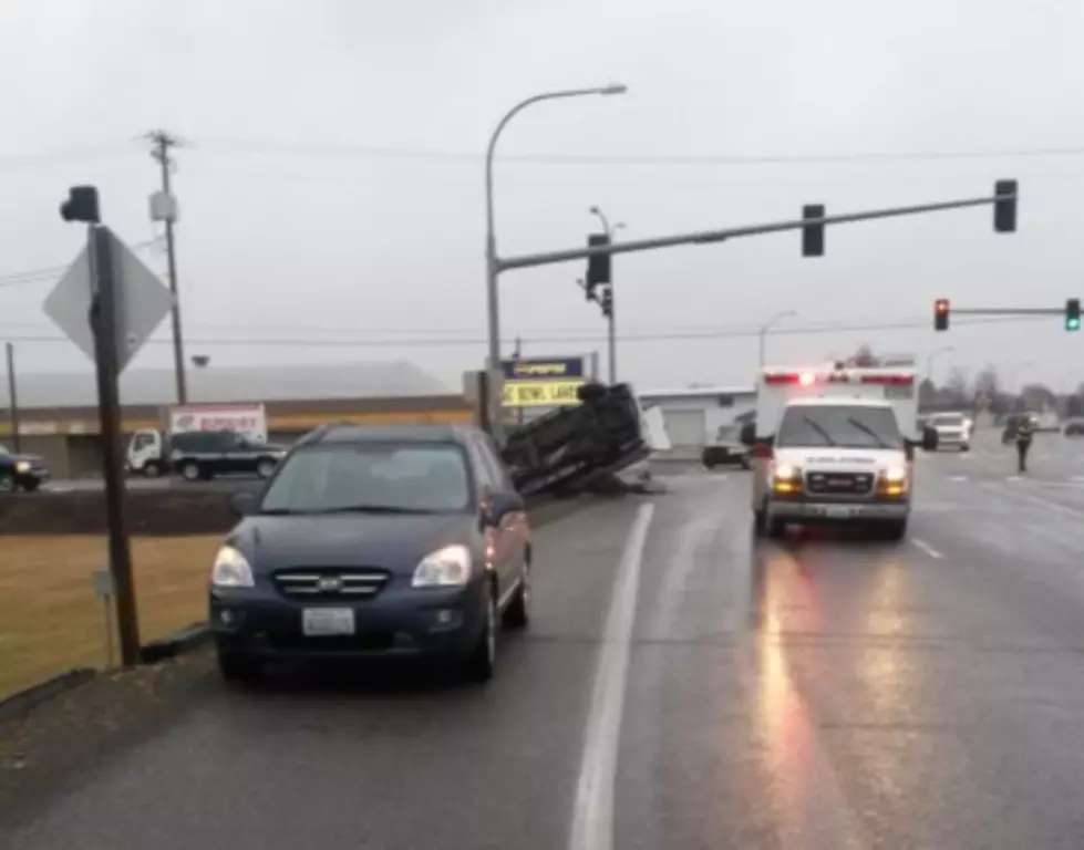 Rolled Car Snarls Rush Hour Traffic on Blue Bridge Onramp in Pasco