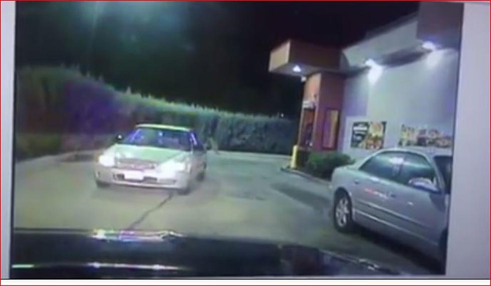 Driver Hits Police Car in Drive-Through, Runs Away and Still at Large