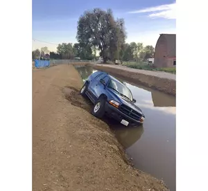 Reckless Driver Dumps Car Into Irrigation Canal, Earns Ticket Not Trophy