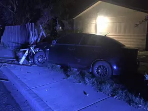 Driver Plows Through Fence Into Yard, DUI Suspected