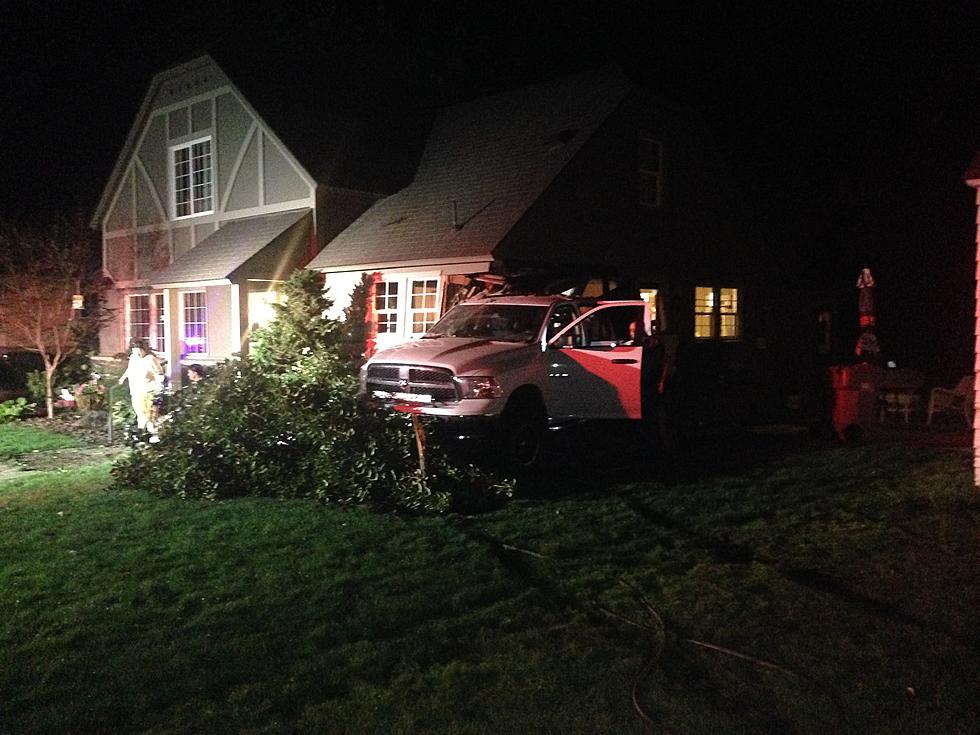 Drunk Driver Slams Into Truck, Sending it Into a House!