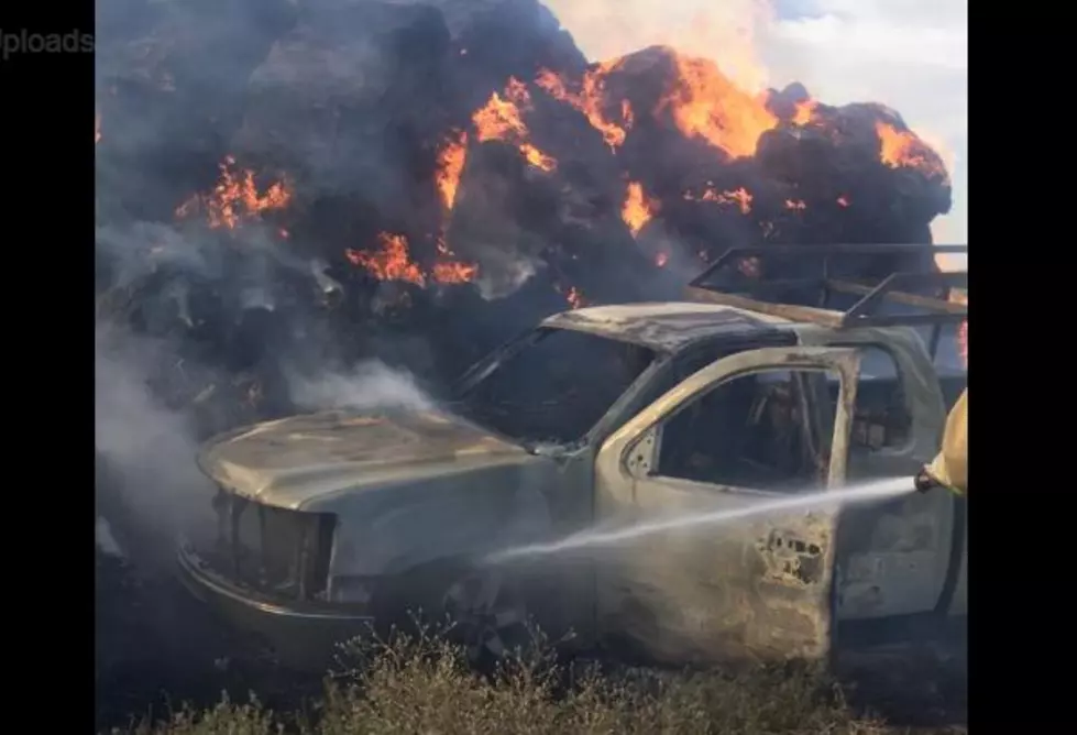 Stubborn Hay Stack Fire Consumes Worker’s Vehicle