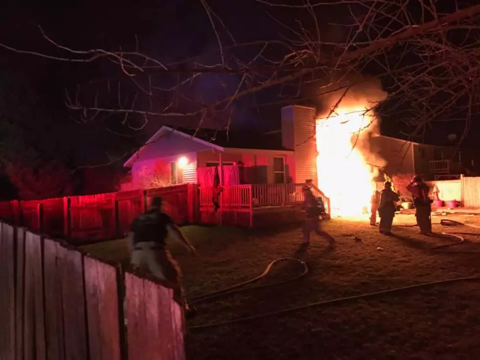 Despite Winds, Firefighters Help Save Family in House Fire