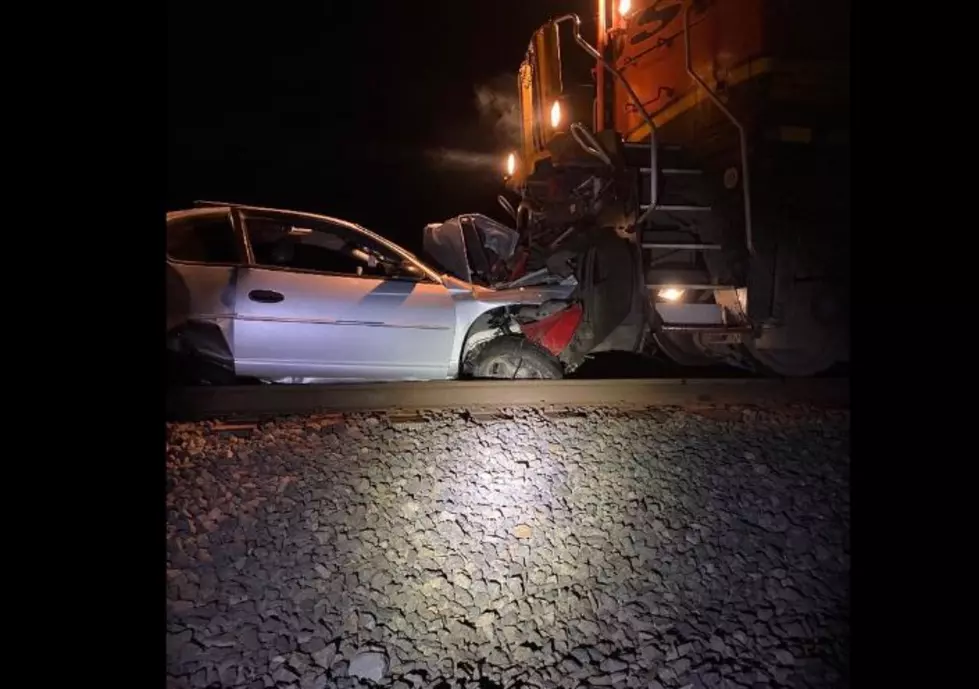 Car Loses Battle with Train, Possibly Intoxicated Driver Escapes