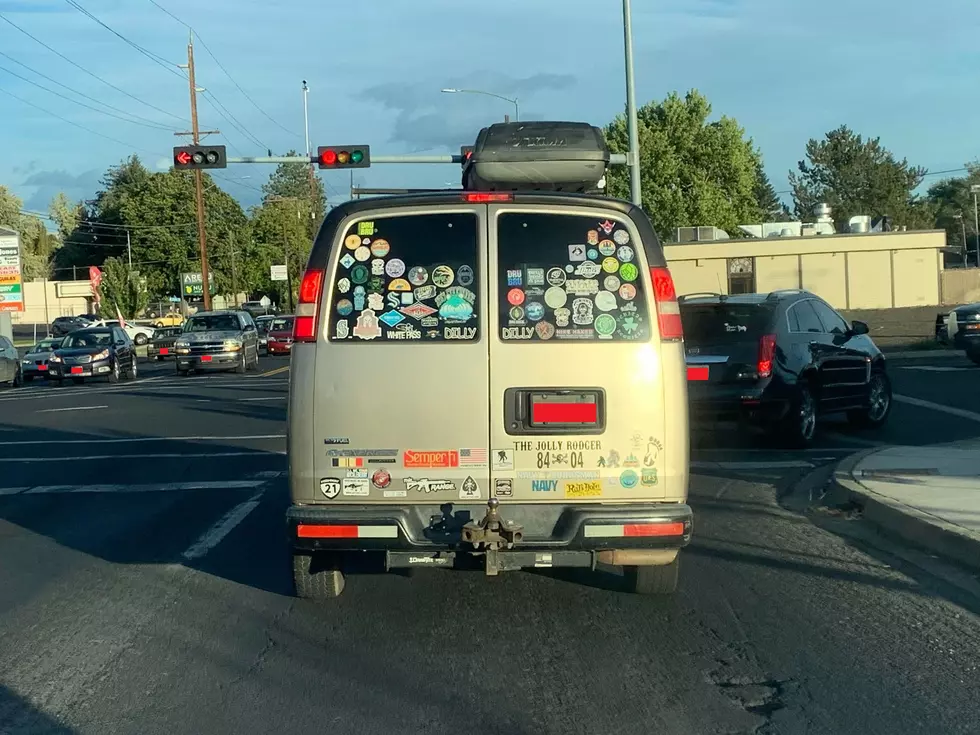 Car with amusing Bumper Stickers