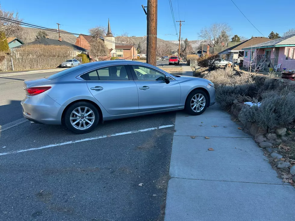 car parked on sidewalk