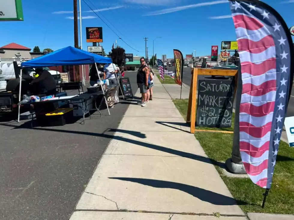 street sale with vendor booth bbqing
