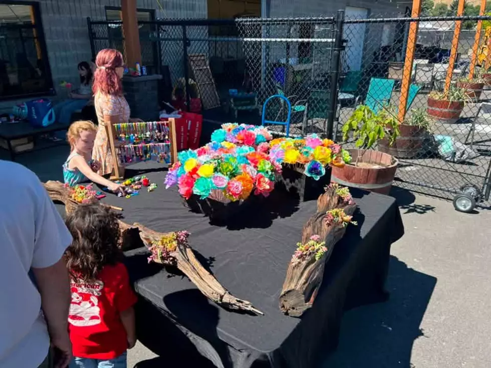 table with flowers, vendor booth