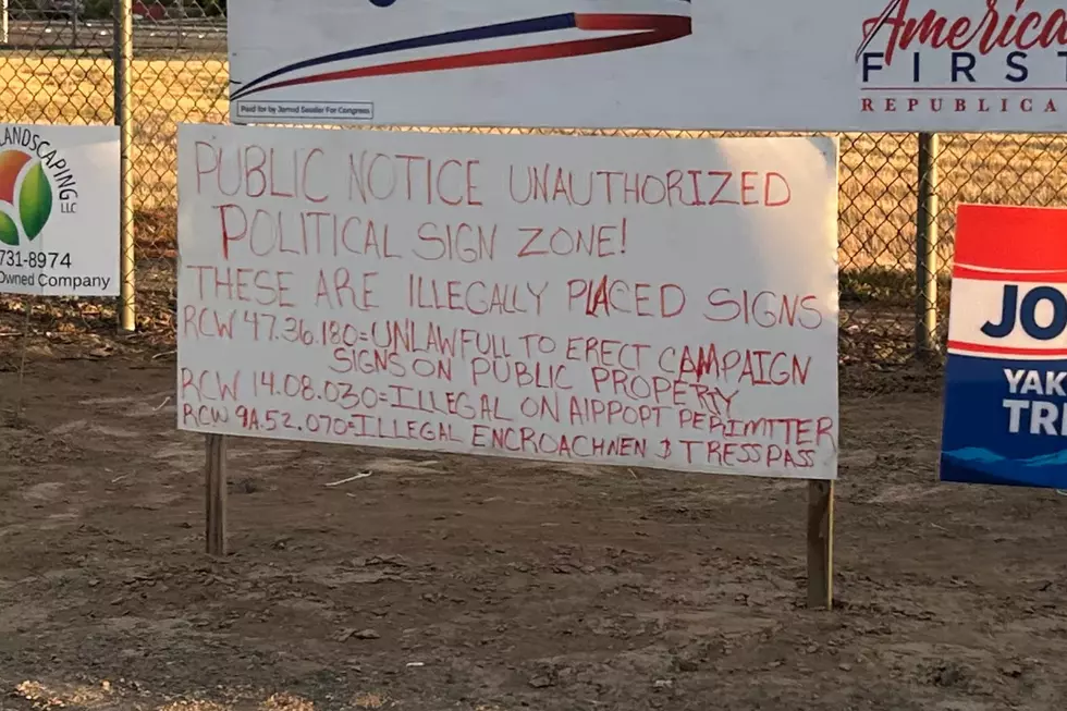 political sign, white red letters.