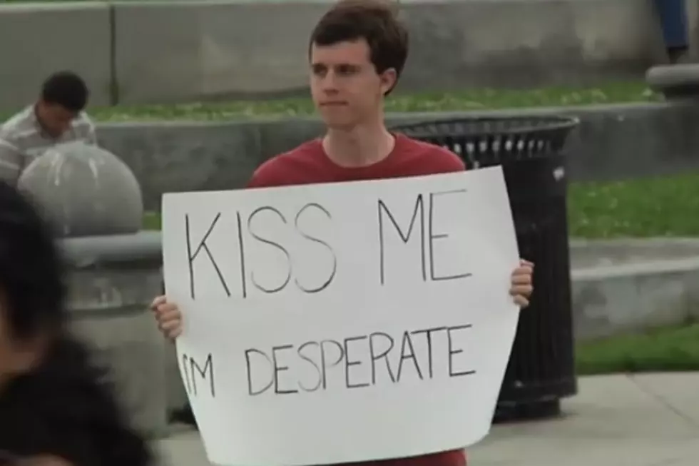 Does Holding a Sign that Says ‘Kiss Me I’m Desperate’ Really Work?