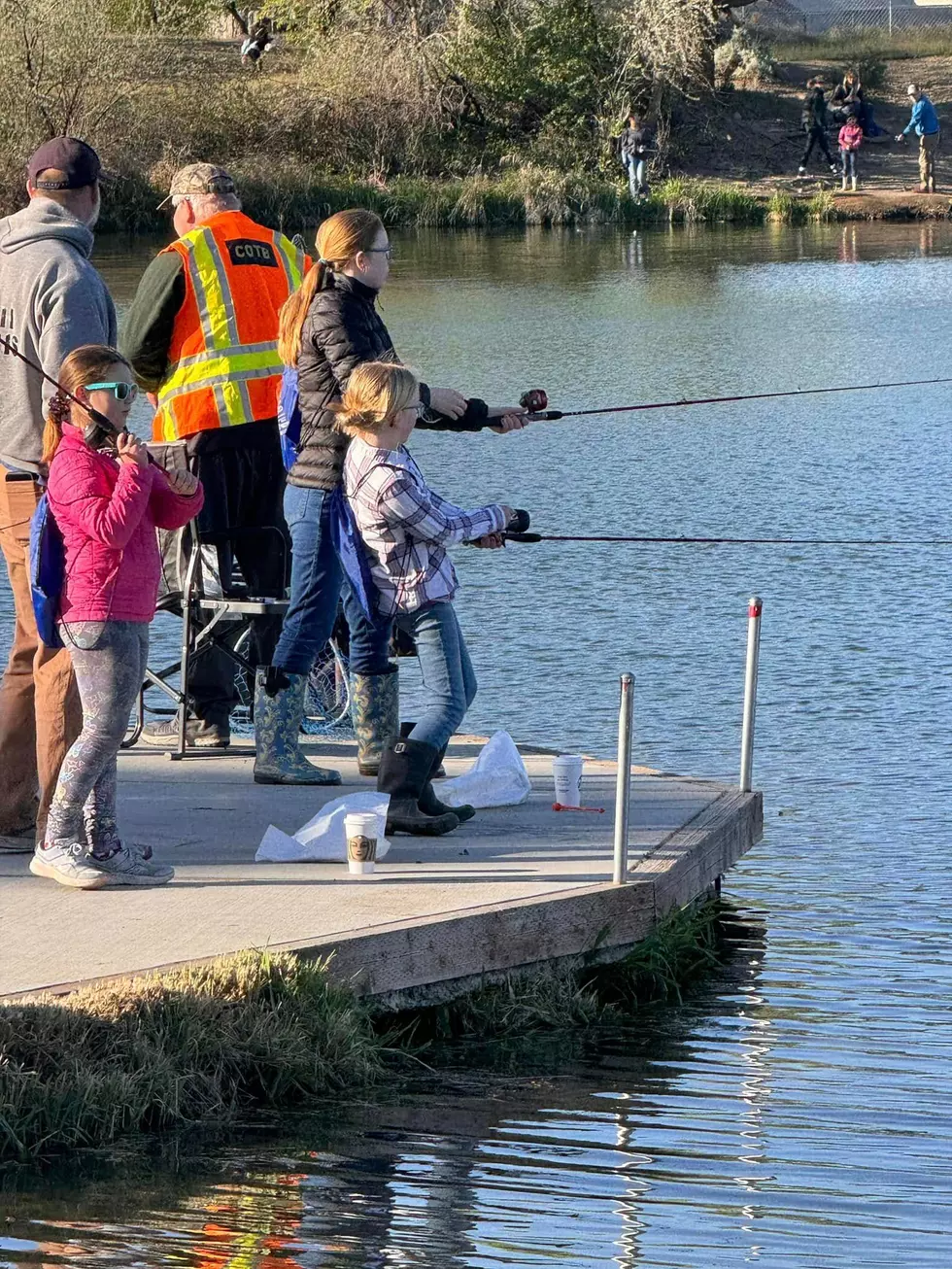 Kids fishing in a lake at Sarg Hubbard Park in Yakima, WA