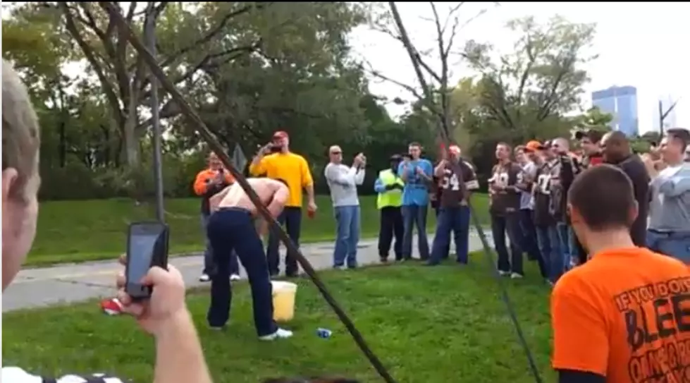 A Cleveland Browns Fan Dunks His Head in… um.. #1, for $450.