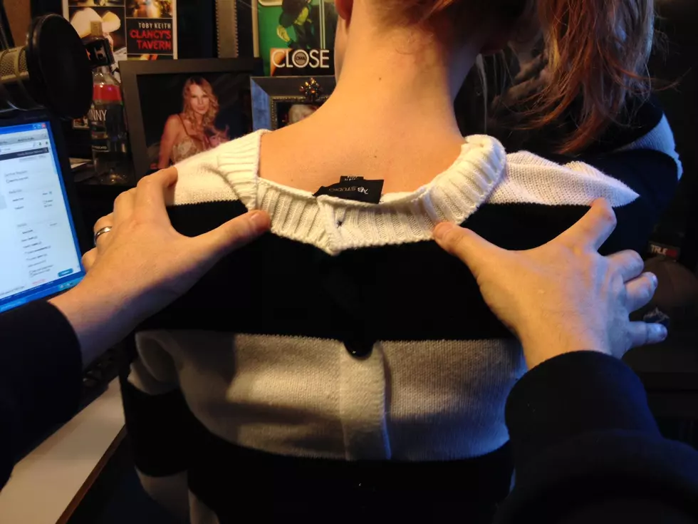 Michele Claims Her Shirt is NOT on Backwards, Shows Tag To Prove it [PHOTO]