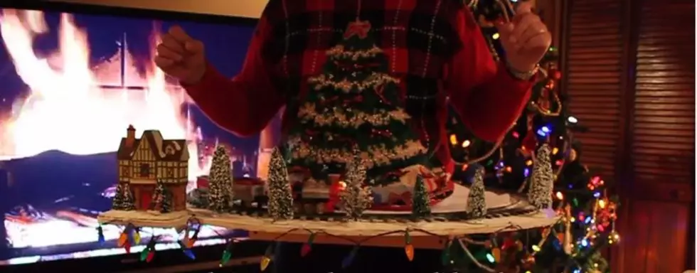 This Is The ULTIMATE Ugly Christmas Sweater. IT HAS A TRAIN!