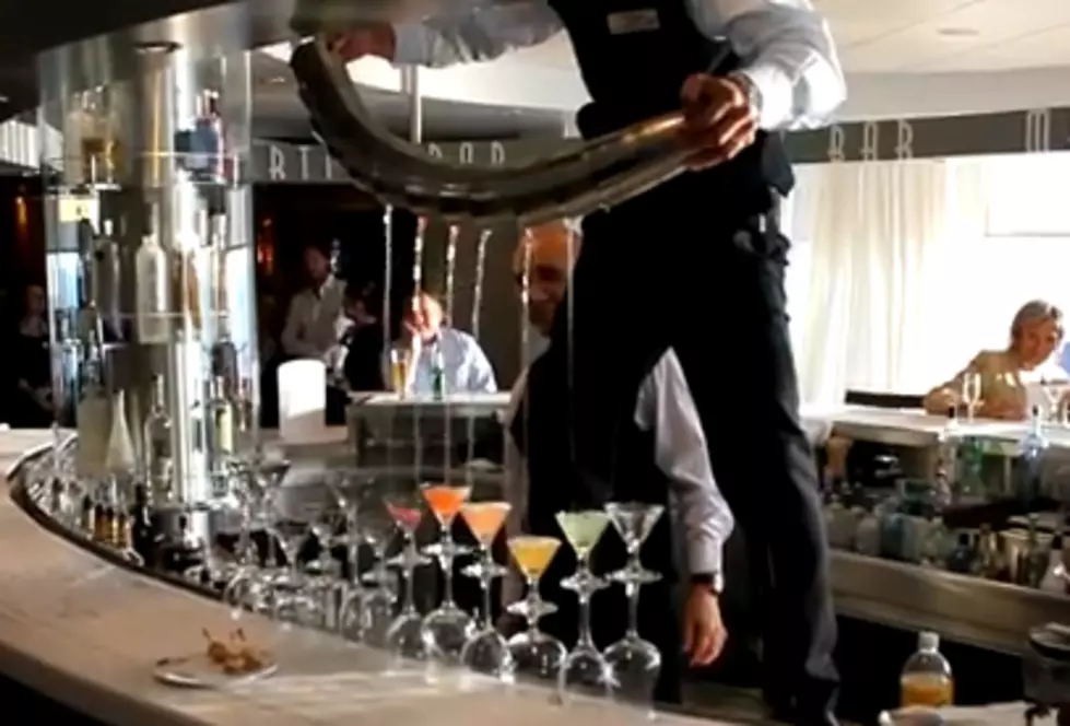 Bartender Pours 12 Different Martinis in 12 Different Glasses at the Same Time [VIDEO]