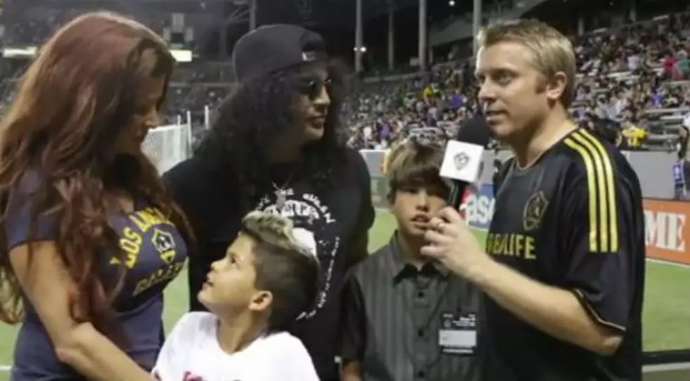 Watch Slash and His Family Getting Interviewed at a Soccer Game [VIDEO]