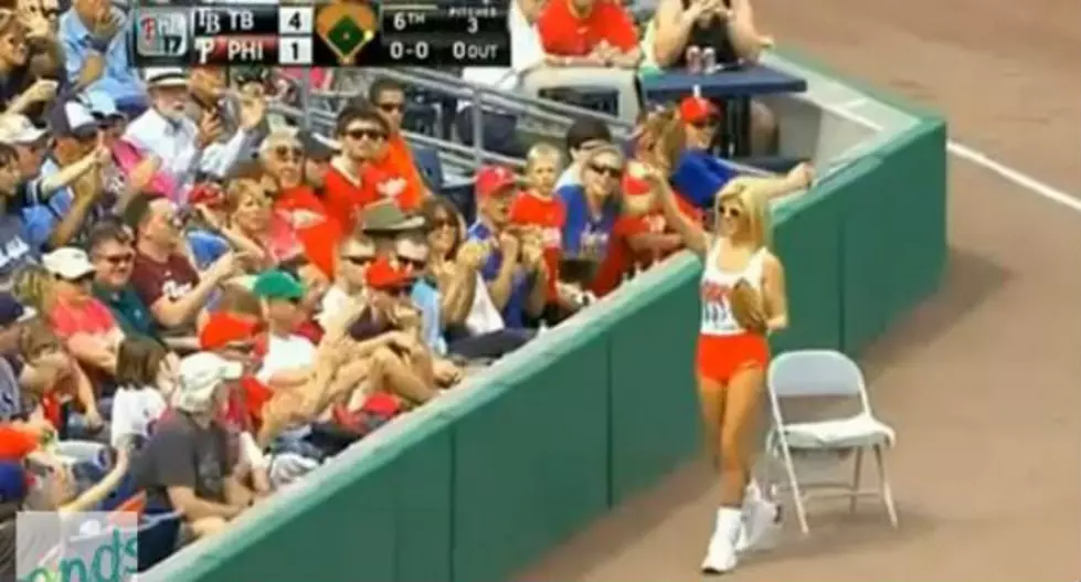 Hooters Ballgirl Tosses Fair Ball Into Stands During Spring Training Baseball Game