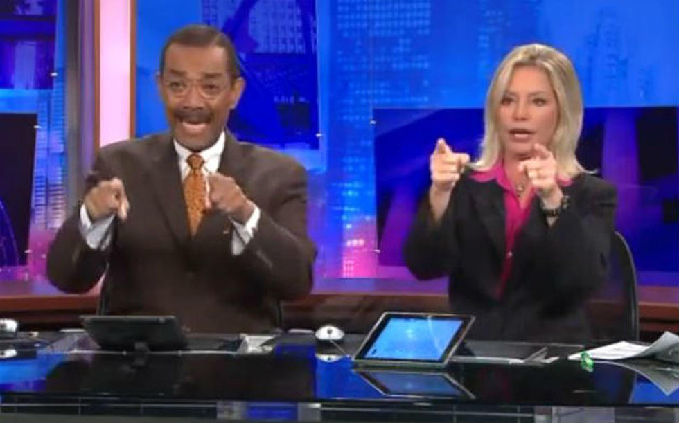 News Anchors Perform Epic Handshake During Commercial Break