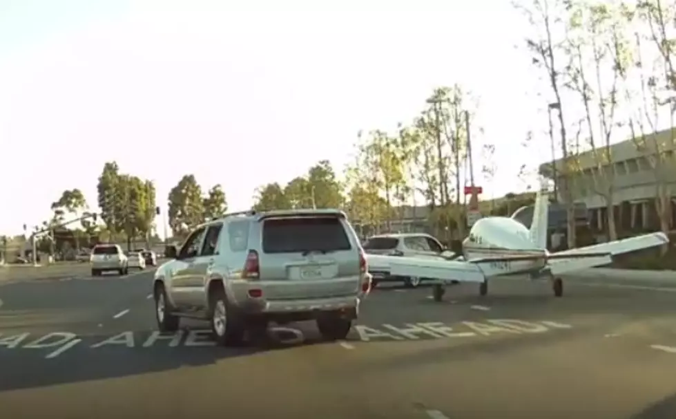 Dash Cam Captures Plane Landing on Califorinia Highway