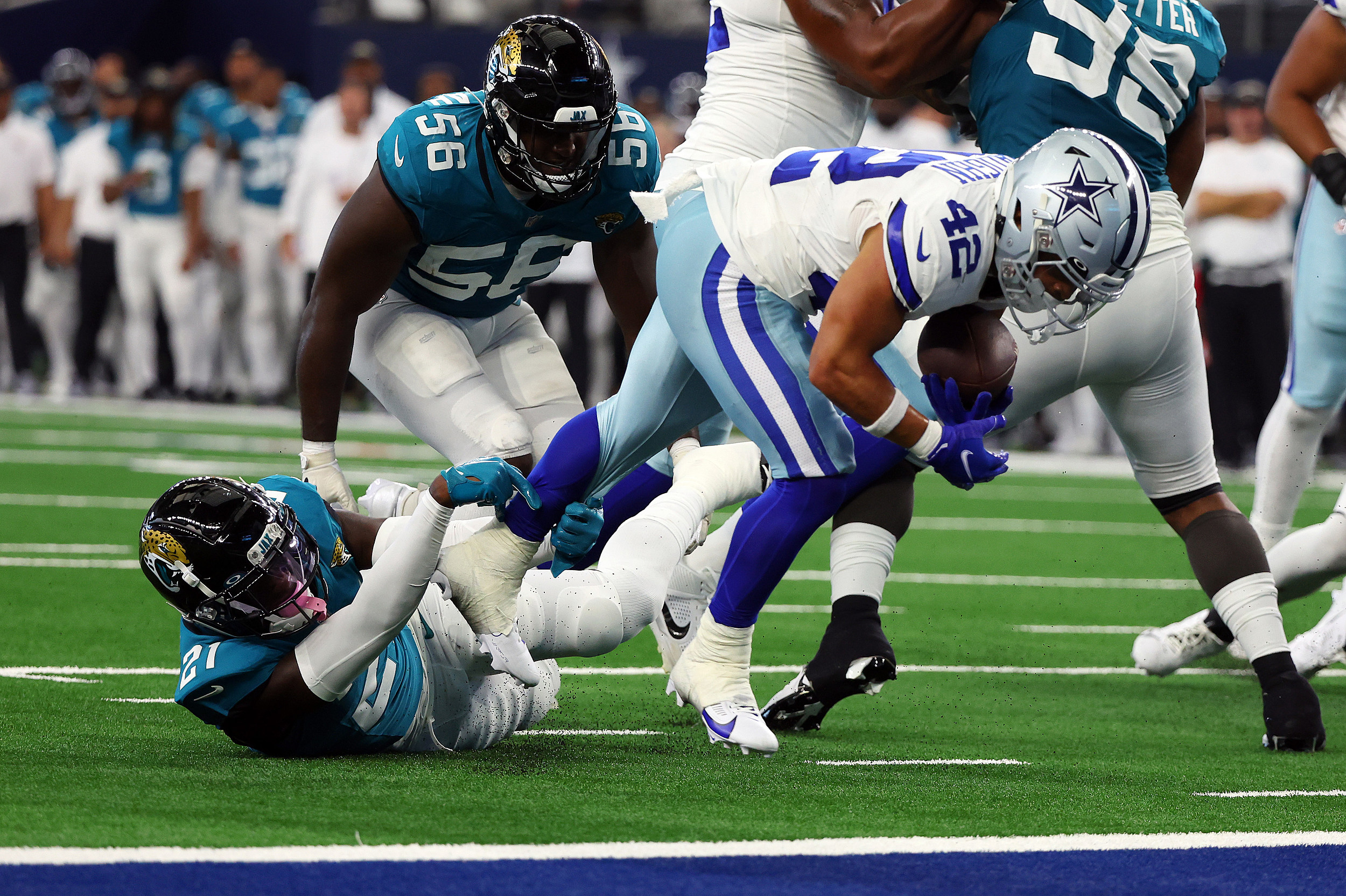 Dante Fowler Jr. #56 of the Dallas Cowboys celebrates after a play News  Photo - Getty Images